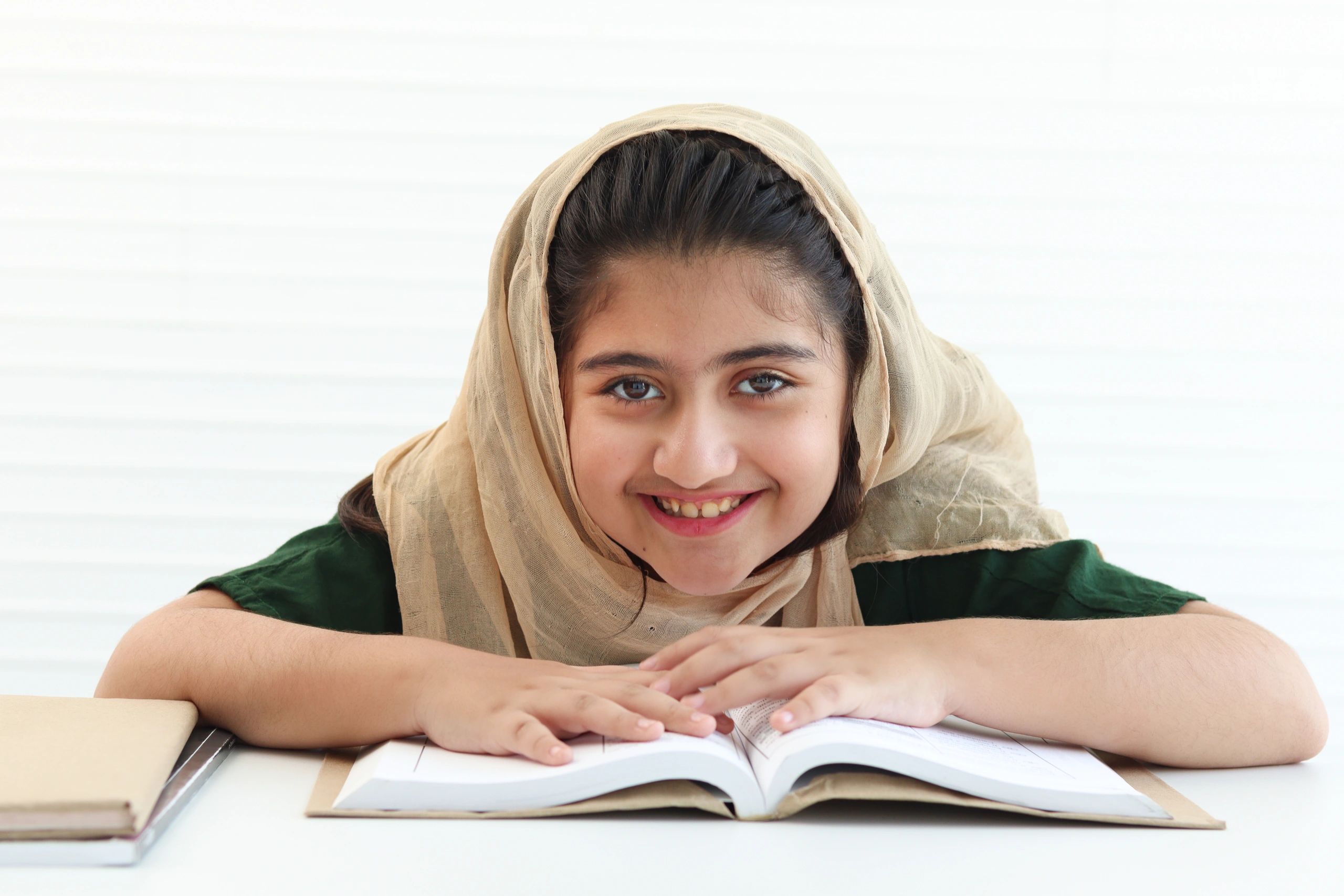 Pakistani children learning Urdu in classroom