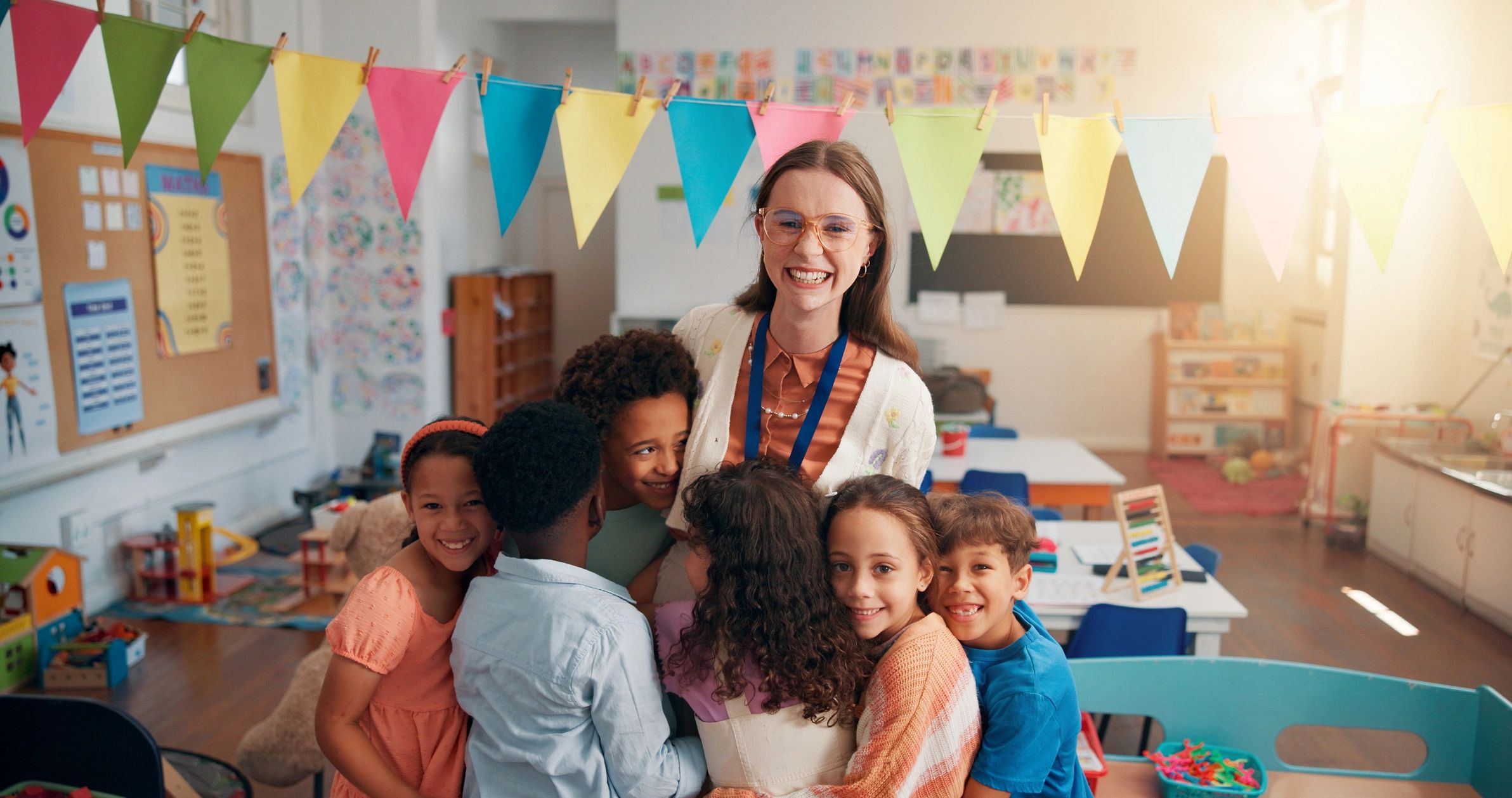 teacher with students classroom multicultural